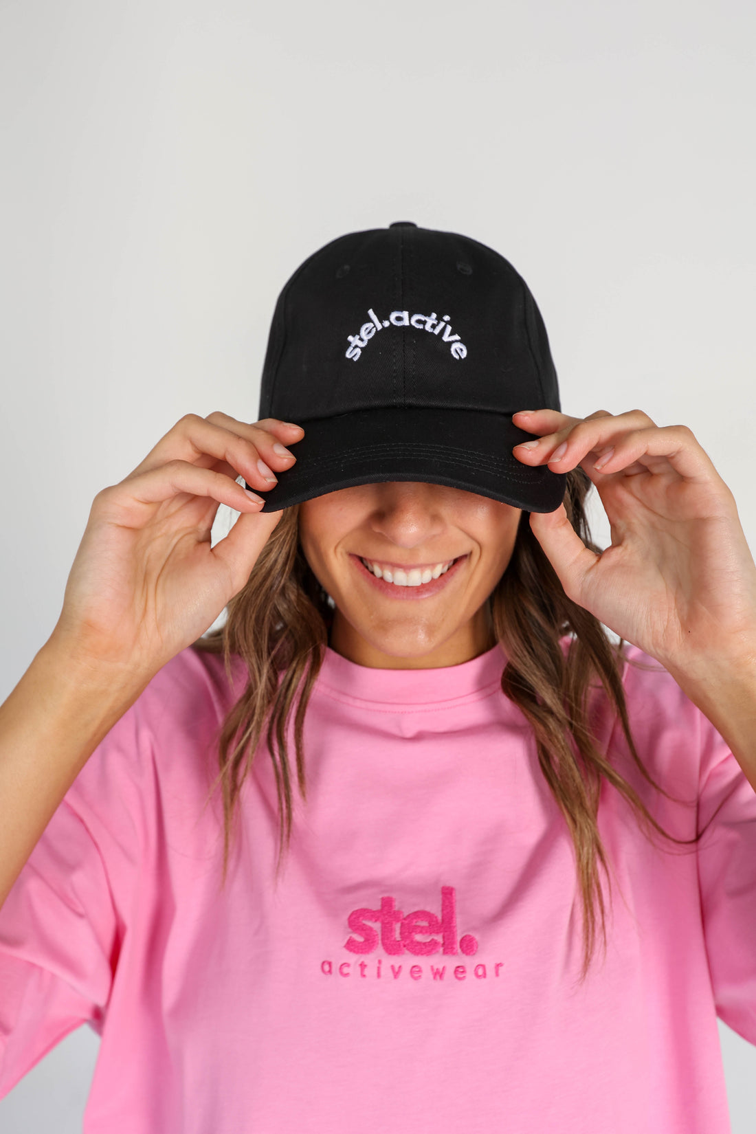 100% cotton tshirt, pink, black cap, stel active